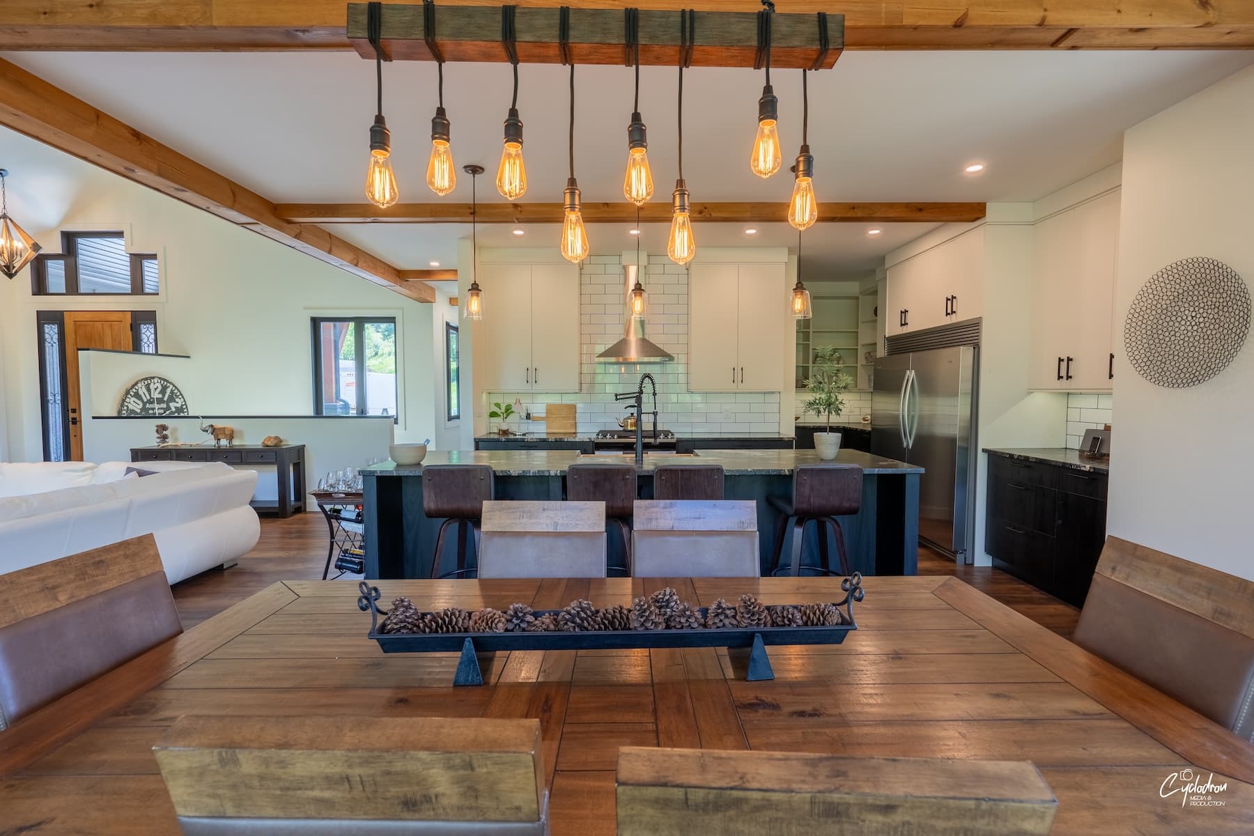 Modern kitchen with pendant lighting and large island